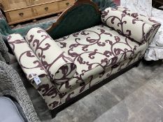 A contemporary upholstered day bed, length 160cm, width 64cm, height 76cm