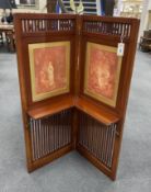 An Edwardian mahogany two fold screen, each panel width 46cm, height 117cm