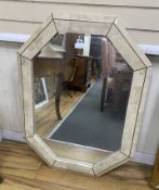 A contemporary octagonal marble effect wall mirror, width 78cm, height 104cm