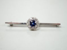 A mid 20th century white metal, sapphire and diamond cluster set bar brooch, 55mm, gross weight 4.