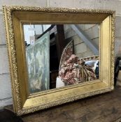 A Victorian rectangular giltwood and composition picture frame now as a wall mirror, width 93cm,