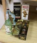 Four assorted bottles of whisky including a Bells Statue of Liberty, and a bottle of Ron Bacardi