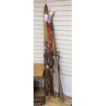 Three pairs of 1950's wooden skis, each with a pair of bamboo poles by Hickory-Sole, Derby, Sport-