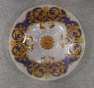 A large glass dish in the Versace style, 48cm diameter