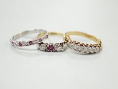 A modern 18ct gold, ruby and diamond chip set half eternity ring, size O and two 18ct & plat rings