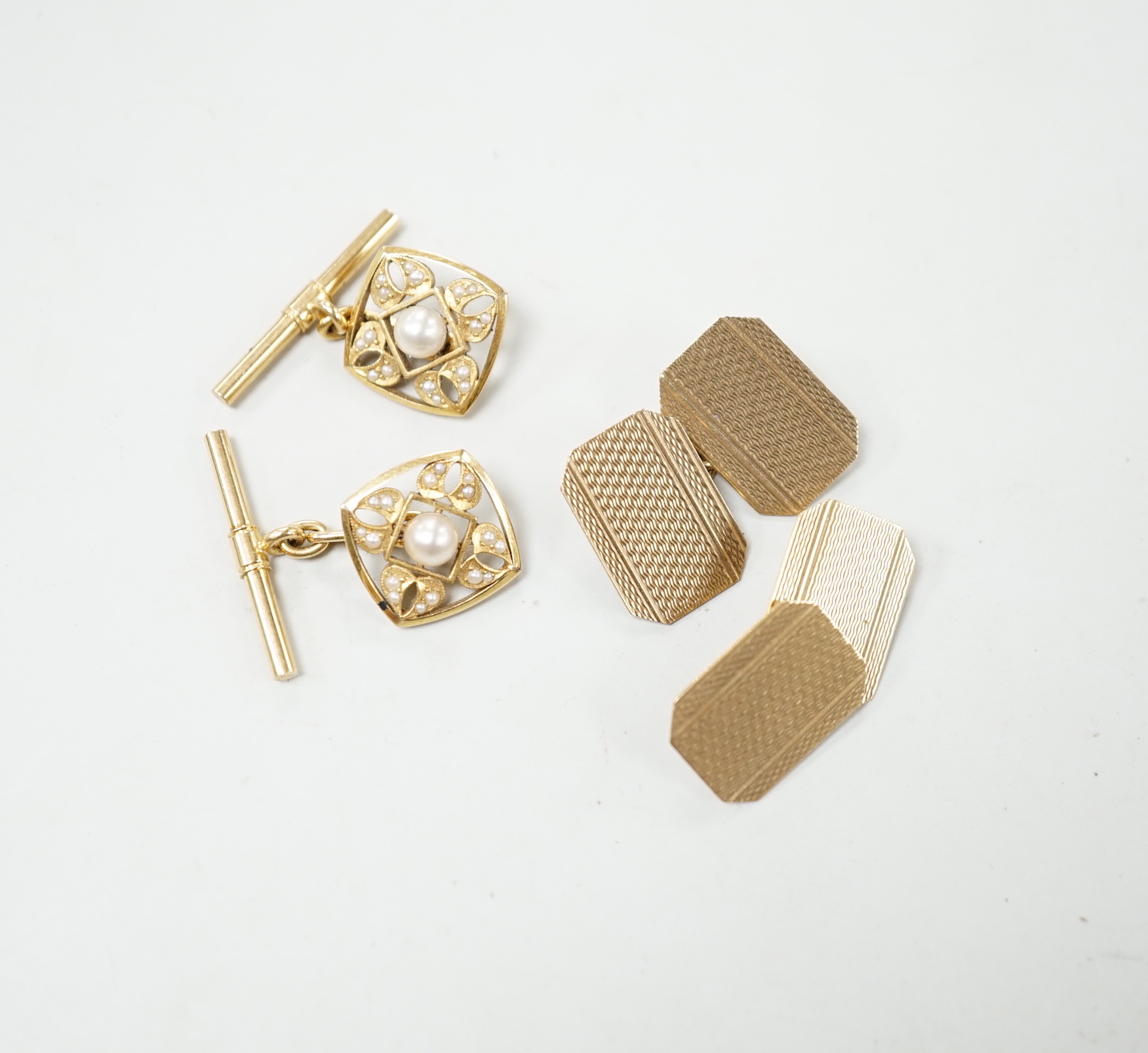 Two pairs of yellow metal cufflinks including engine turned 9ct and cultured pearl set, gross weight