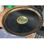 A Victorian toleware tray with transfer cartouche of children playing with model boats, width 60cm