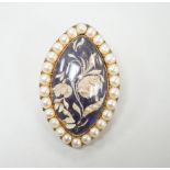 A Georgian yellow metal, enamel and seed pearl set elliptical brooch, 4cm, gross weight 13.9 grams.