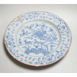 An 18th century Delft chinoiserie charger, 36cm diameter
