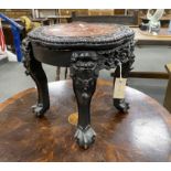 A Chinese circular marble topped ebonised hongmu jardiniere stand, width 41cm, height 35cm