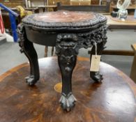 A Chinese circular marble topped ebonised hongmu jardiniere stand, width 41cm, height 35cm