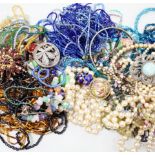 A quantity of assorted costume jewellery, including a paste cluster ring.