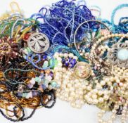 A quantity of assorted costume jewellery, including a paste cluster ring.
