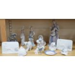 Ten Lladro figures including polar bears together with four further Lladro pieces including a dish