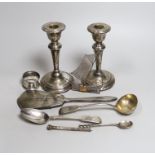 A pair of Edwardian silver candlesticks, Birmingham, 1909, 15.2cm (a.f.) a George IV silver sauce