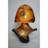 An indistinctly signed multi coloured art glass mushroom shaped table lamp, 35cm high