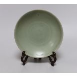 A Chinese Celadon dish and stand, 16cm diameter