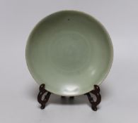 A Chinese Celadon dish and stand, 16cm diameter