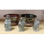 Two Chinese cloisonné enamel bowls on hardwood stands, enamelled with dragons chasing the flaming