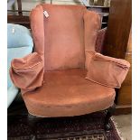 A George I style mahogany upholstered wing armchair, width 94cm, depth 82cm, height 118cm