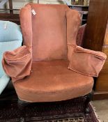 A George I style mahogany upholstered wing armchair, width 94cm, depth 82cm, height 118cm