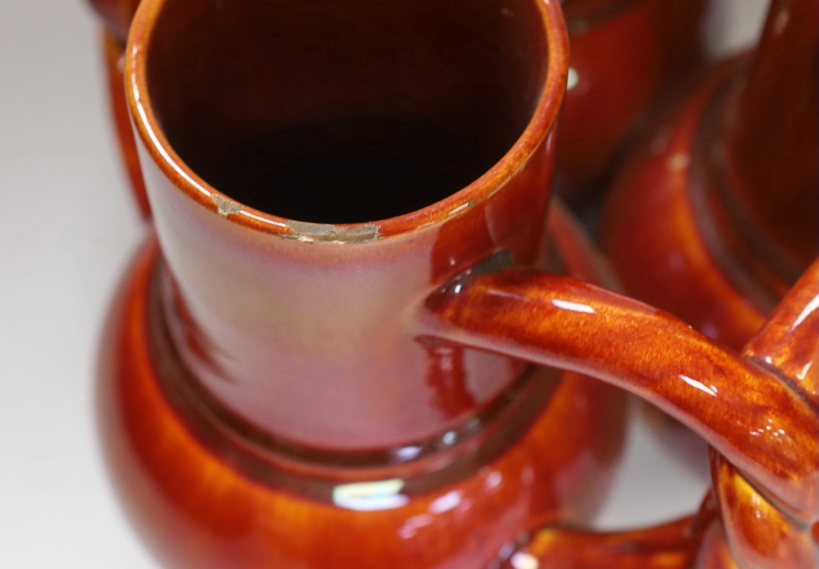 A Burmantofts Pottery three section fuddling cup with interwoven handles in dark burnt orange, - Image 4 of 6