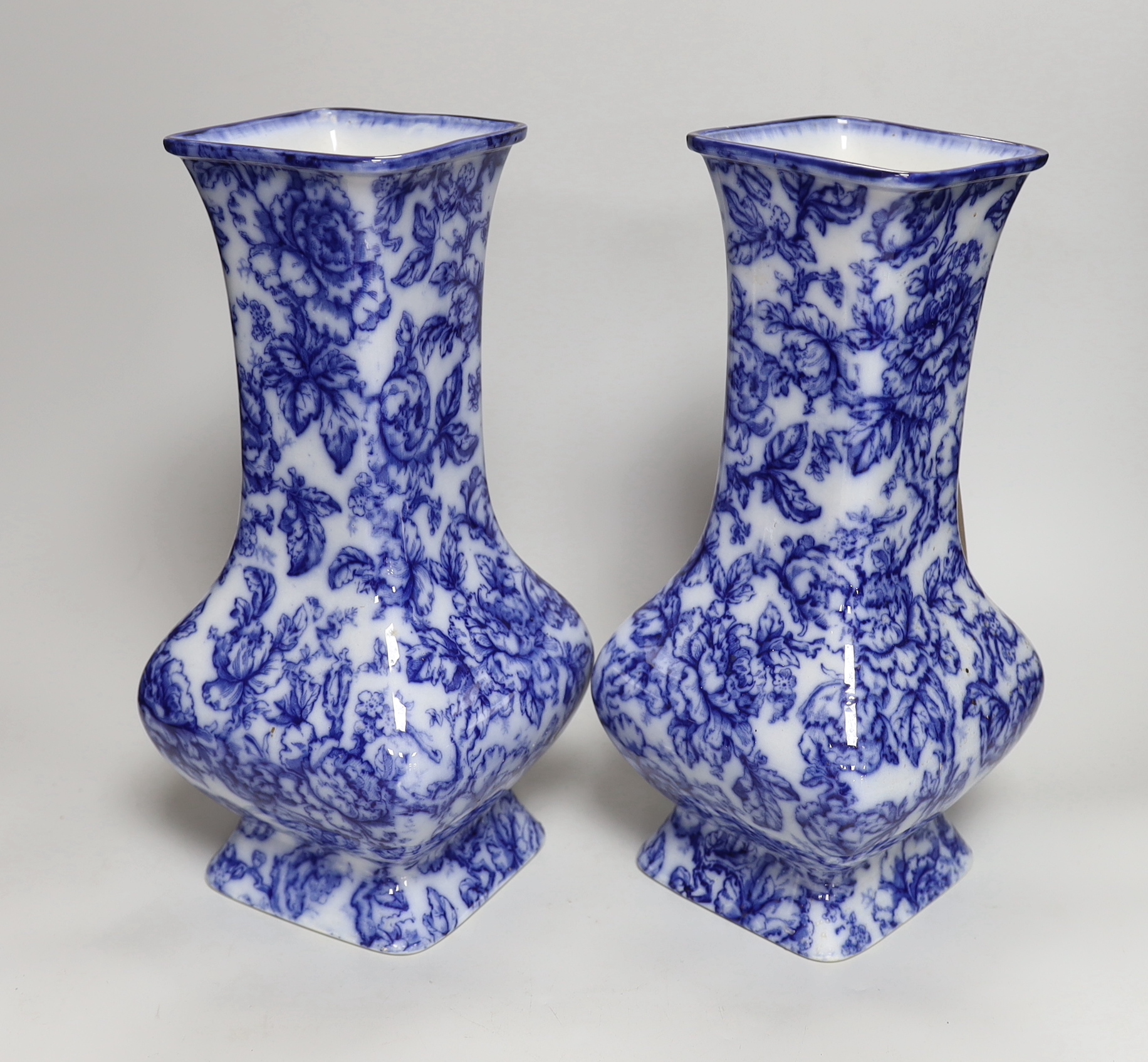 A pair of Losol ware blue and white vases, a slipware jug, a faience candle holder and a Chinese tea - Image 4 of 6