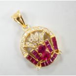 A modern 18k yellow metal, diamond chip, round and square cut ruby cluster set drop pendant, overall