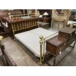 A Victorian style super kingsize tubular brass bedstead, with box base, length approx. 220cm,