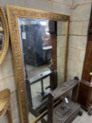 A Victorian style rectangular gilt composition wall mirror, 111cm, height 173cm