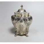 A late Victorian embossed silver bombe shaped tea caddy, Nathan & Hayes, Birmingham, 1894, 14.3cm,