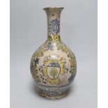 An 18th century Italian maiolica pottery bottle vase, 27cm high