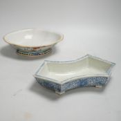 A 19th century Chinese blue and white ingot shaped dish and a famille rose footed dish, the