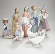 Six Lladro figures of girls, three with hats, one with a Teddy, two peasant girls with flowers and
