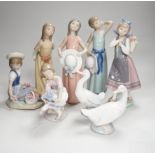 Six Lladro figures of girls, three with hats, one with a Teddy, two peasant girls with flowers and