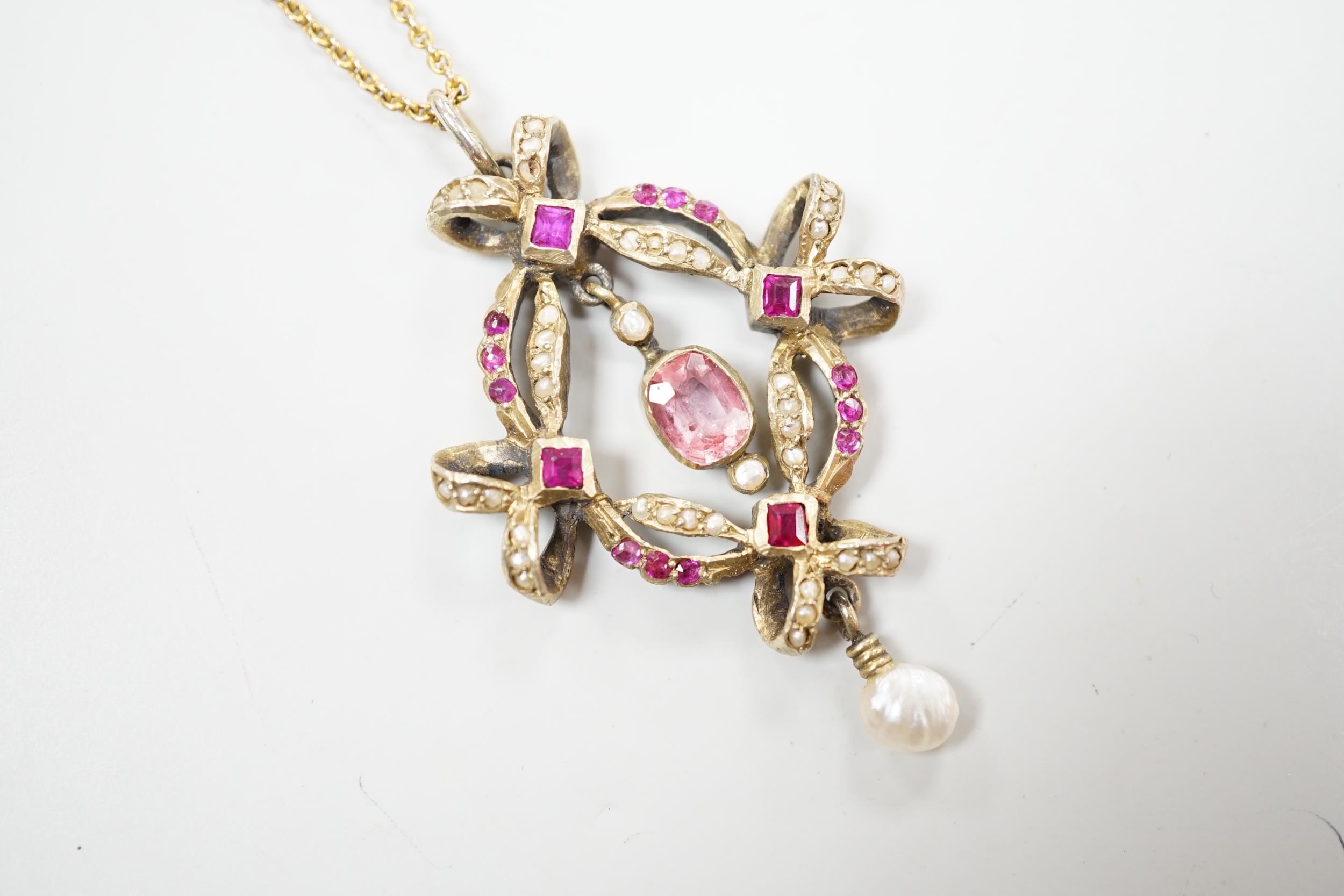 An early 20th century Continental gilt white metal pendant set with rubies, seed pearls and other - Image 2 of 3