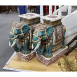 A pair of Chinese Guandong pottery ‘elephant and howdah’ stands, 56cm high