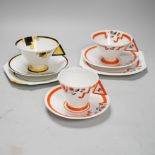 Two Art Deco Shelley Vogue shaped handled trios and a cup and saucer, largest cups 6.5cm high