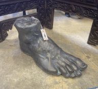 After the Antique - a painted cast stone classical foot, length 49cm