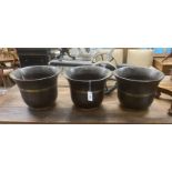 A set of three brass bound staved wood buckets, diameter 36cm, height 29cm