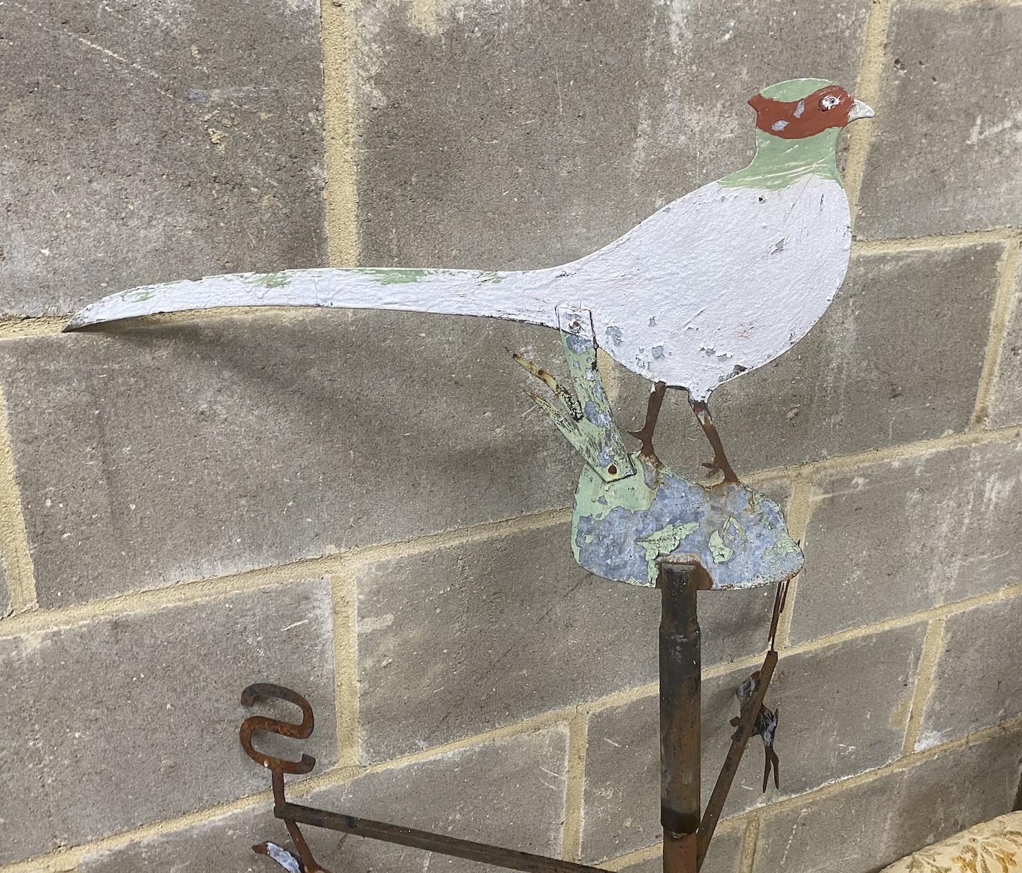 A vintage painted wrought and cut metal weather vane, height 156cm