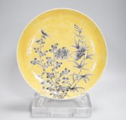 A Chinese grisaille enamel yellow ground dish, Guangxu mark and possibly of the period (1875-