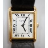 A lady's gold plated Cartier Tank wrist watch, with quartz movement, 2.5cm