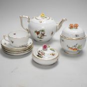 A Herend handpainted pot and cover, a cup and four saucers and teapot decorated with birds and