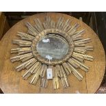 A vintage carved wood sunburst wall mirror, diameter 62cm