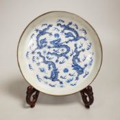 A 19th century Chinese blue and white ‘dragon’ dish and stand 18.5cm diameter Provenance - the