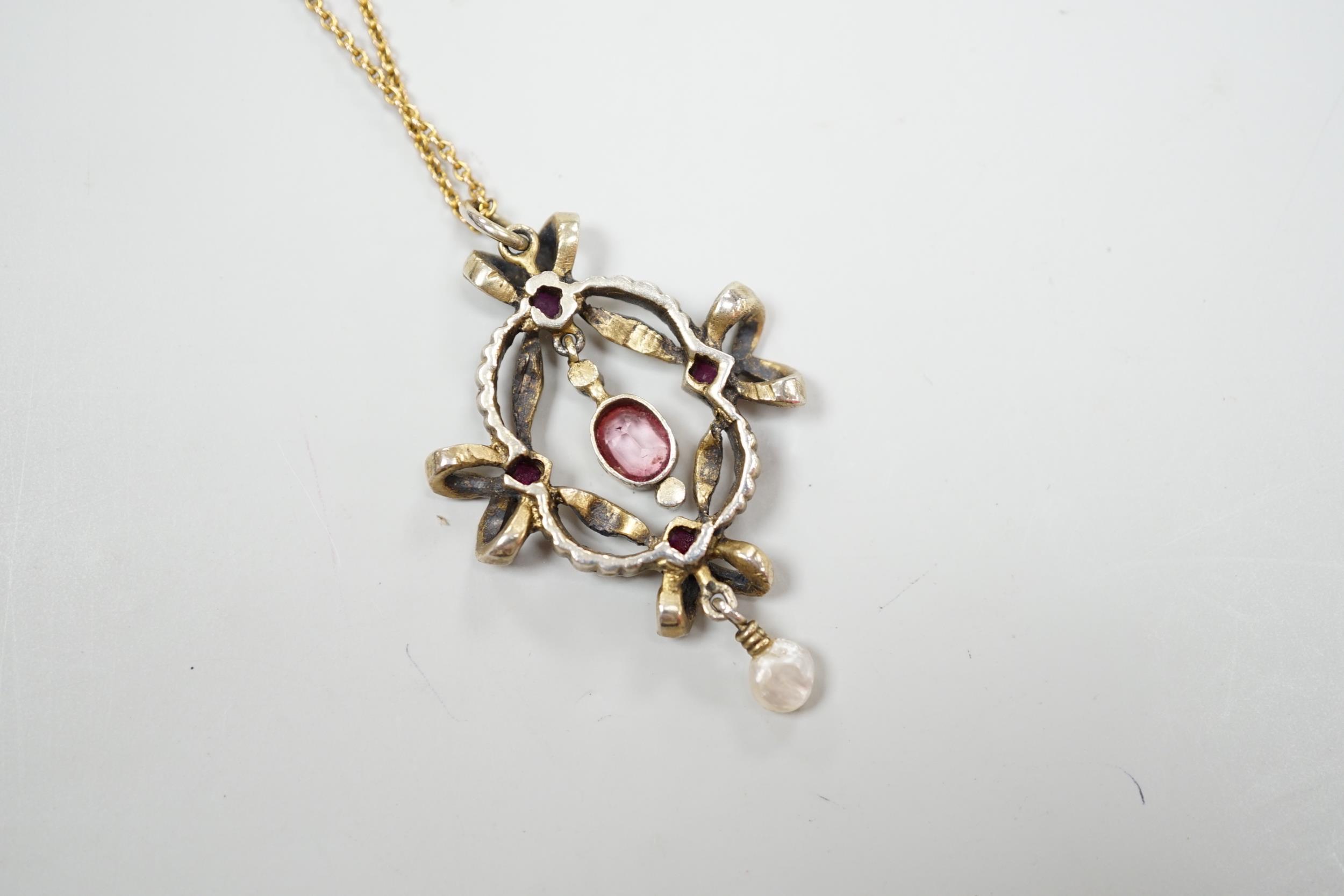 An early 20th century Continental gilt white metal pendant set with rubies, seed pearls and other - Image 3 of 3