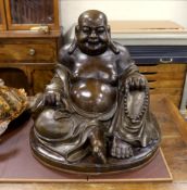 A massive Chinese bronze seated figure of Budai, 62cm high
