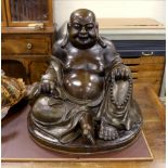 A massive Chinese bronze seated figure of Budai, 62cm high