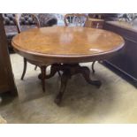 A Victorian oval figured walnut tilt top loo table, length 134cm, width 98cm, height 71cm